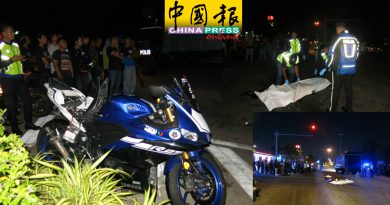 疑闯红灯  轿车撞后逃  骑士死