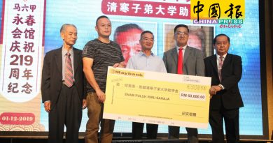 明年继捐大专助学金  另拨5万给育民中小学