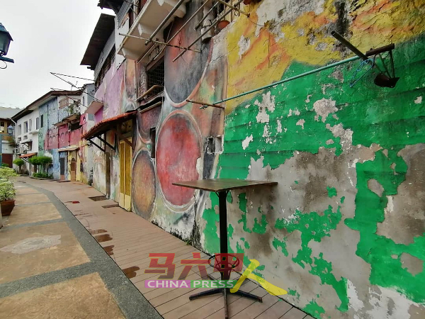 甘榜于汝至板底街的老店壁画，是美化马六甲河第一期计划下的产物。
