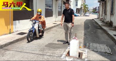 位处“三不管”地带 一个沟盖    数部门踢来踢去