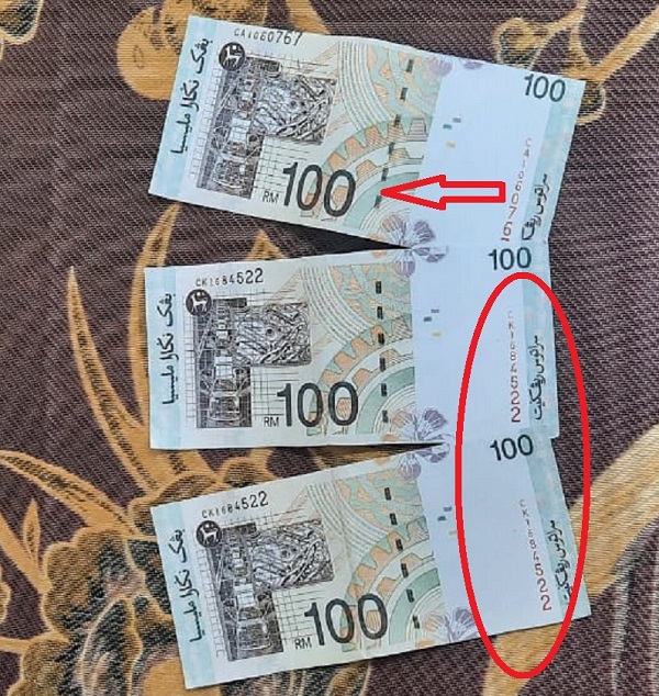 图下两张100令吉的系列号码雷同，而上面第一张与下面两张的钞票水印线条位置不一。