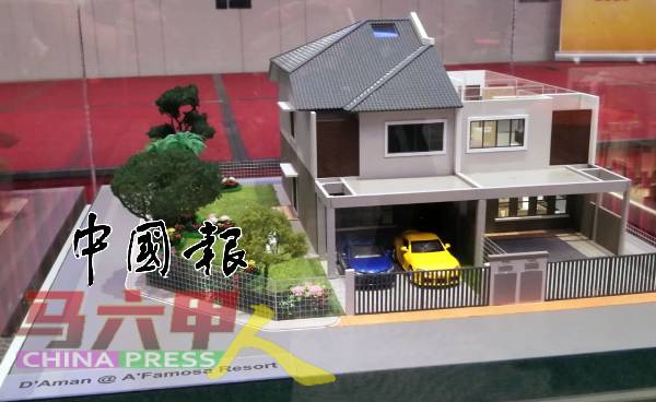 首期共建25间双层排屋。图为房屋模型。