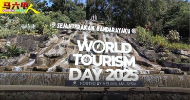 沿途挂横幅 置打卡牌  “大换装”迎世界旅游日
