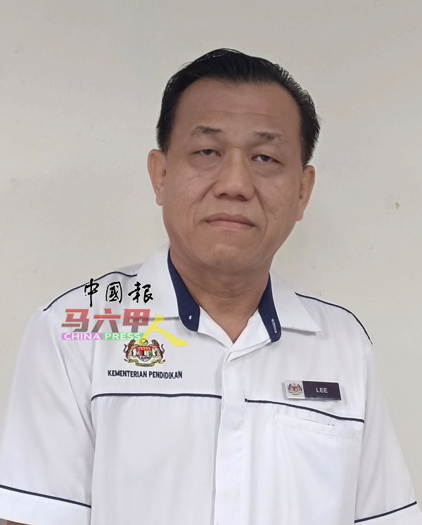 武吉波浪华小校长李勤烈。