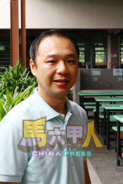 邱必庆。