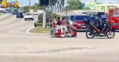 3人共乘微型交通工具 繁忙道路违法行驶