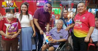 三忠宫传递社会温情  2500包福米送弱势群